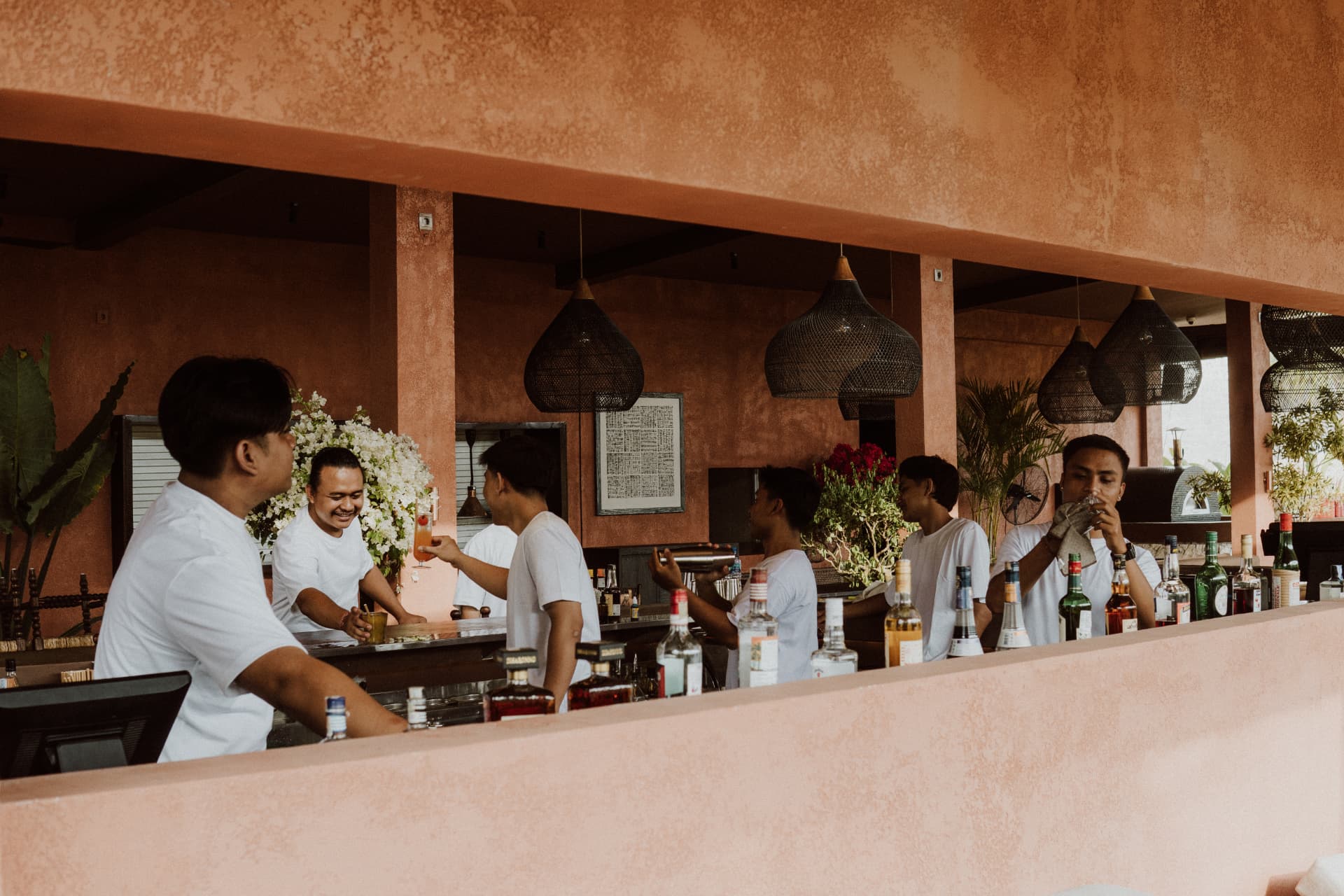 The TAMAN team at work behind the bar